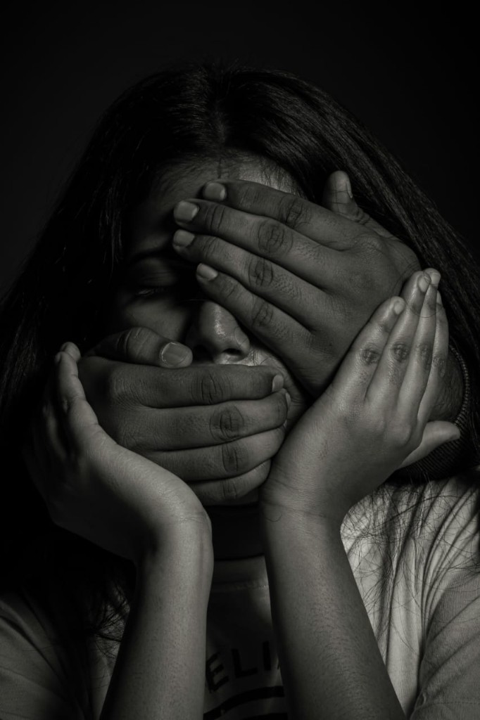 Symbolic portrait representing silence and trauma from abuse